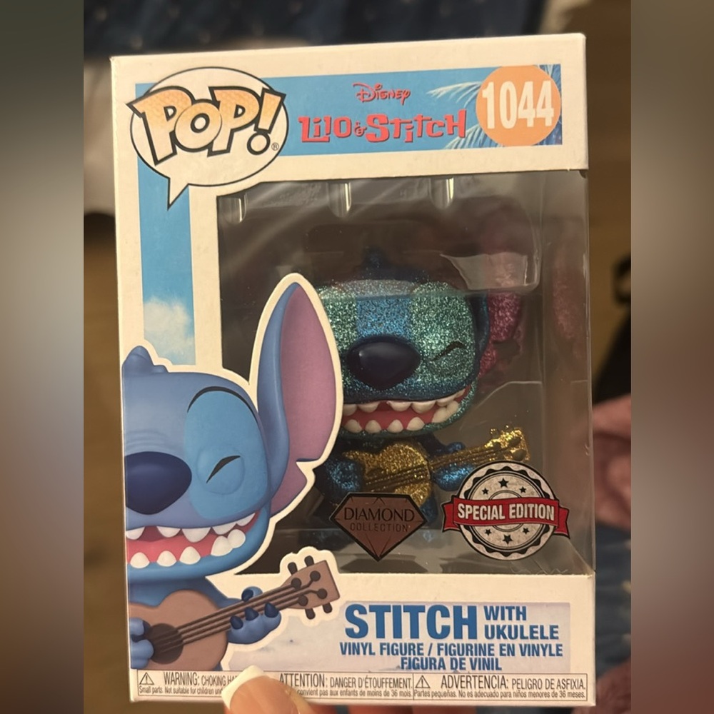 Funko Pop! Glittery Blue and Purple Stitch with Gold Guitar